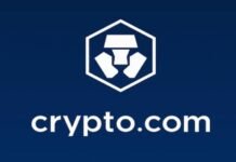 Crypto.com National Trust Bank: a exchange dá passo histórico para virar banco federal nos EUA em 2026 Logotipo da Crypto.com ao lado do selo do OCC (Office of the Comptroller of the Currency) representando aprovação bancária.